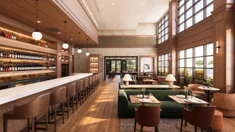 Interior rendering of Sprig restaurant at Hilltop Skaneateles with bar seating, dining tables, large windows, and warm wood finishes.